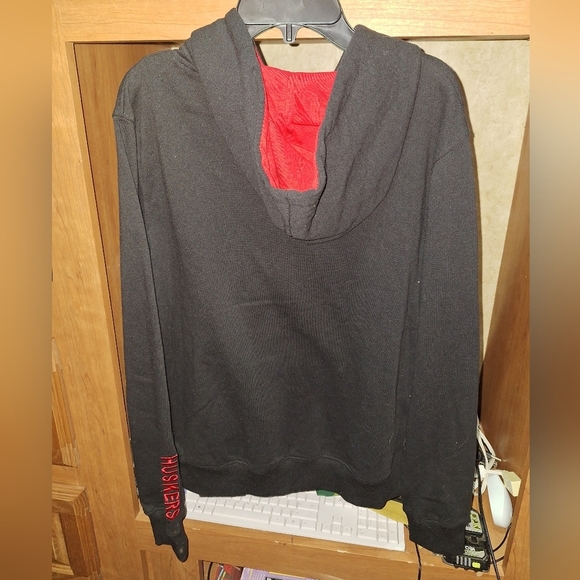 A Colosseum Nebraska Corn Huskers black hoodie in a women's size medium. NWT - Picture 2 of 9